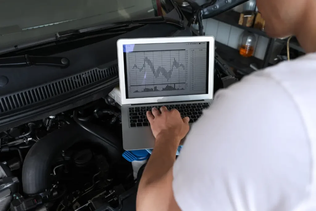 image of technician running engine diagnostics test