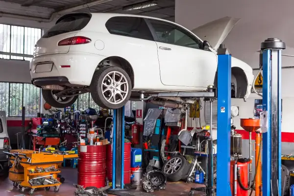 Car on lift for auto maintenance